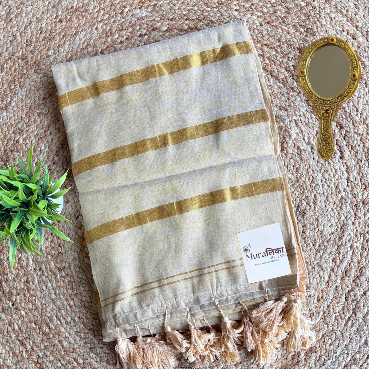 Sunehri cream and gold tissue cotton saree for Onam, full length