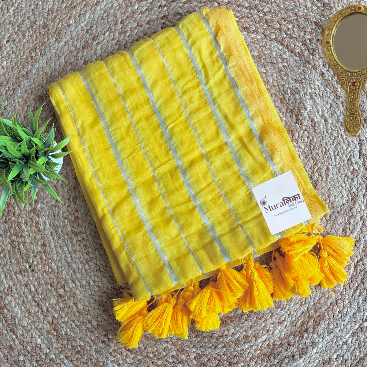 Texture detail of the Haldi yellow mulmul cotton weave
