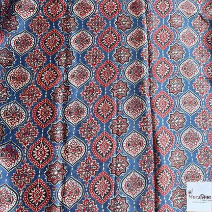 Ajrakh hand block printed Modal silk saree by Muralika the label, showcasing intricate traditional block print design and elegant fabric.