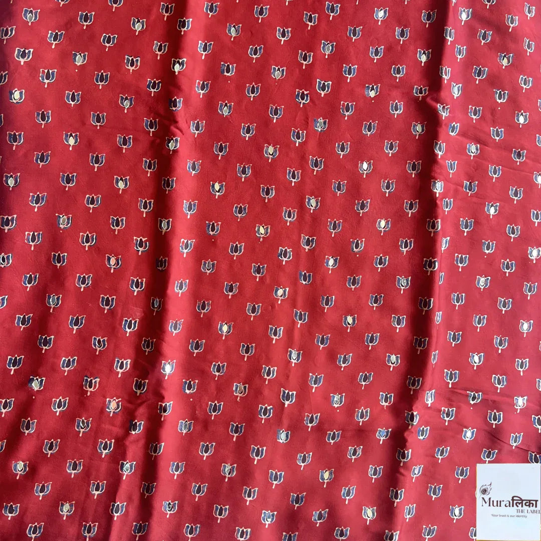 Ajrakh mirror work Modal silk saree by Muralika The Label featuring traditional mirror embroidery and vibrant, elegant fabric.