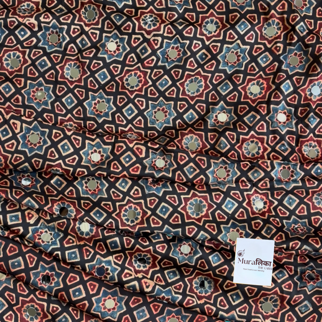 Close-up of the hand-set mirror work on the Chandani Ajrakh saree