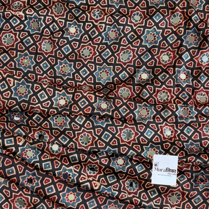 Close-up of the hand-set mirror work on the Chandani Ajrakh saree