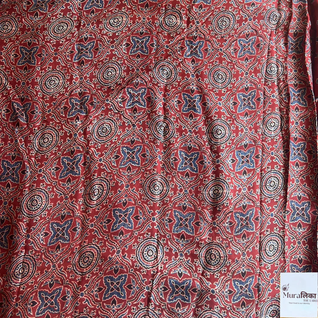 Ajrakh mirror work Modal silk saree by Muralika the label featuring intricate mirror detailing and vibrant traditional patterns.