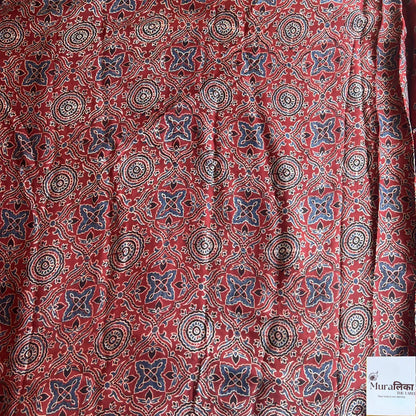 Ajrakh mirror work Modal silk saree by Muralika the label featuring intricate mirror detailing and vibrant traditional patterns.