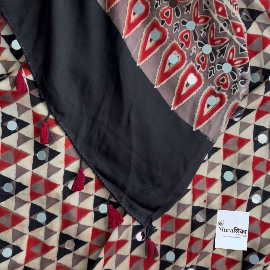 Sunaina Ajrakh mirror work saree in modal silk with triangle-jaal print and black tasselled pallu
