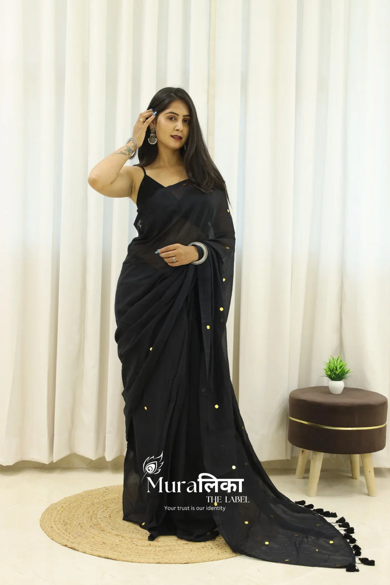 Black Mulmul cotton saree from Muralika the label with delicate, soft fabric and traditional design.