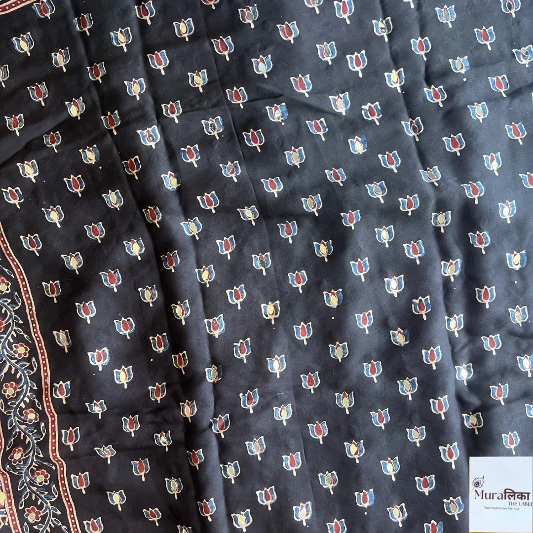 Muralika The Label Ajrakh Mirror Work Modal Silk Saree with traditional patterns and intricate mirror embellishments.