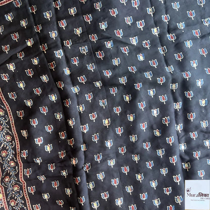 Muralika The Label Ajrakh Mirror Work Modal Silk Saree with traditional patterns and intricate mirror embellishments.
