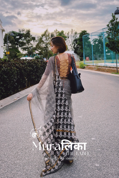 Chex Black and White Ajrakh Hand Block Printed Modal Silk Saree — flat lay of the full saree