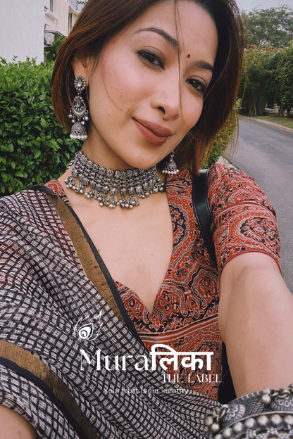 Chex Black and White Ajrakh Hand Block Printed Modal Silk Saree — worn and draped, front view
