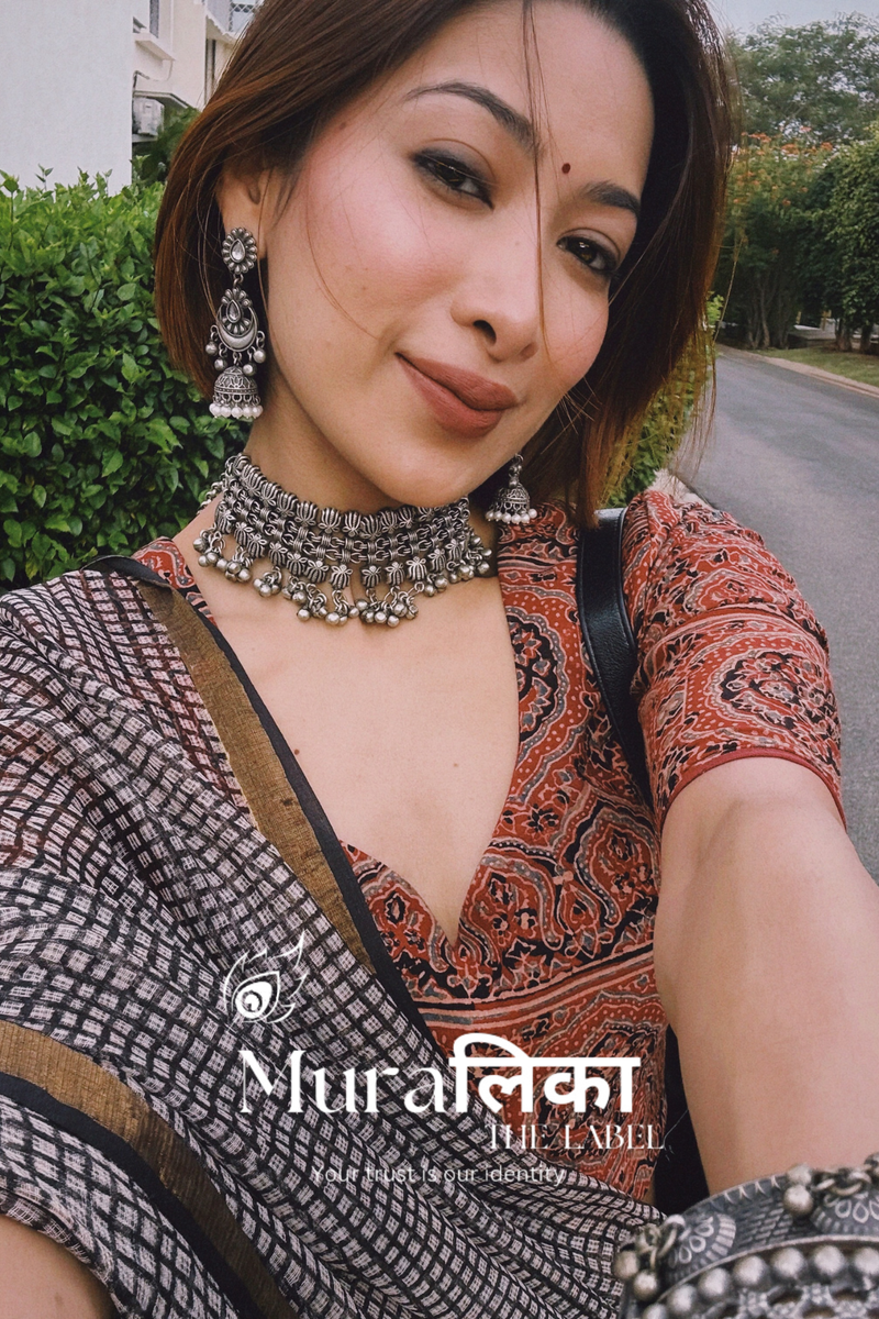 Chex Black and White Ajrakh Hand Block Printed Modal Silk Saree — worn and draped, front view