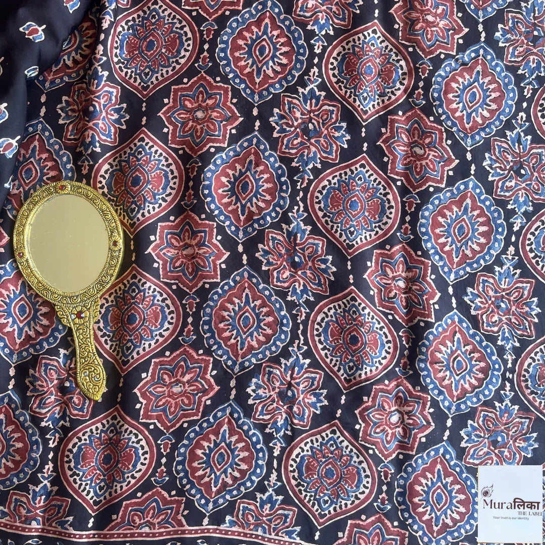 Elegant Ajrakh mirror work Modal silk saree by Muralika the Label, featuring intricate traditional mirror embroidery and rich fabric.