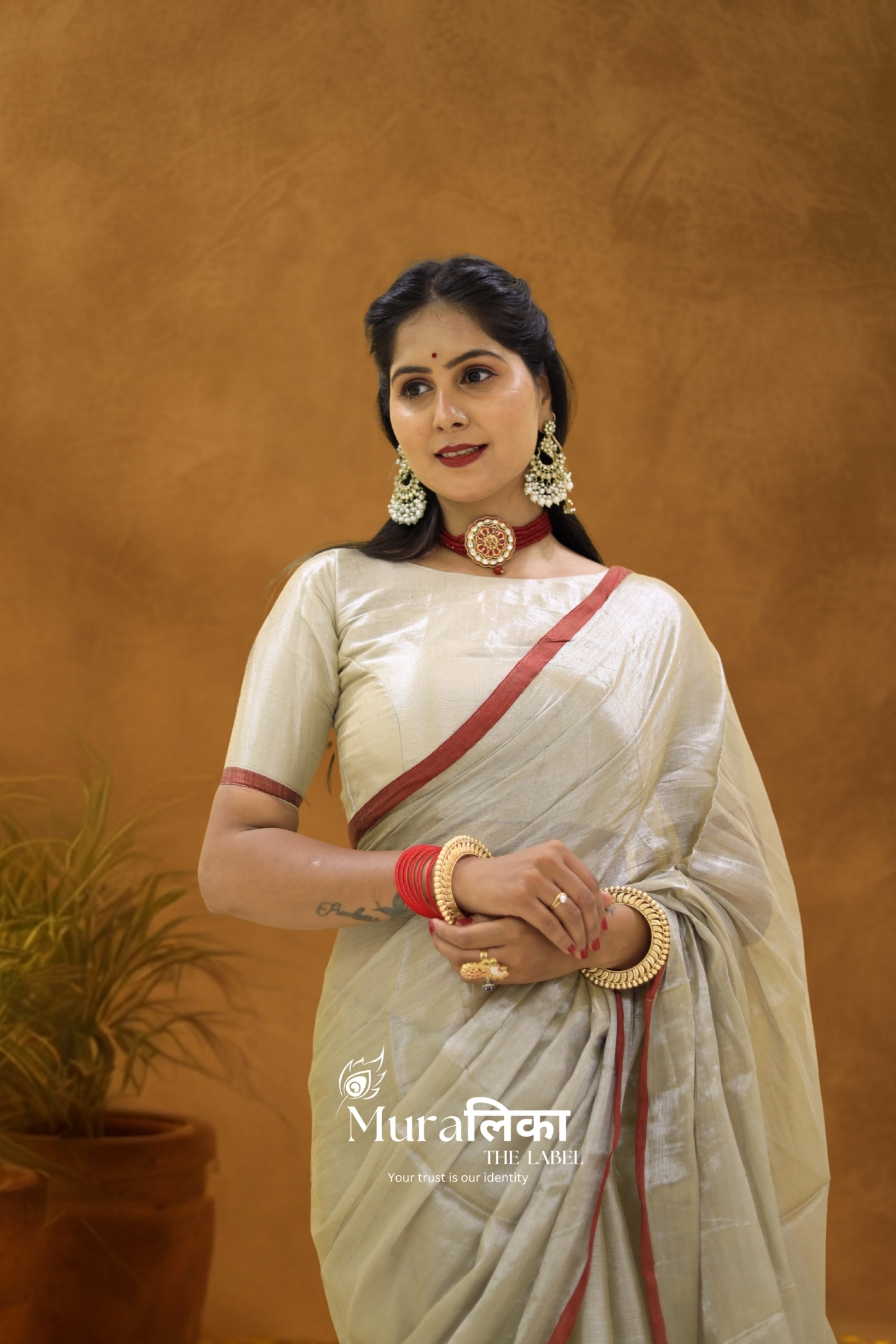 Muralika Pure Elegance Handloom Tissue Saree