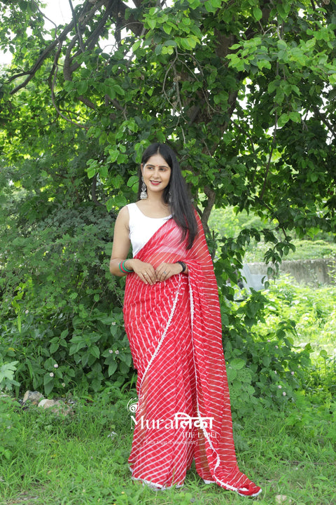Chilli Red Hand Dyed Chiffon Leheriya Saree with Lace Border — worn and draped, front view